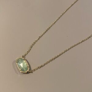 Kendra Scott necklace. 🌺🩵 Gold tone with aqua stone. 17 inches